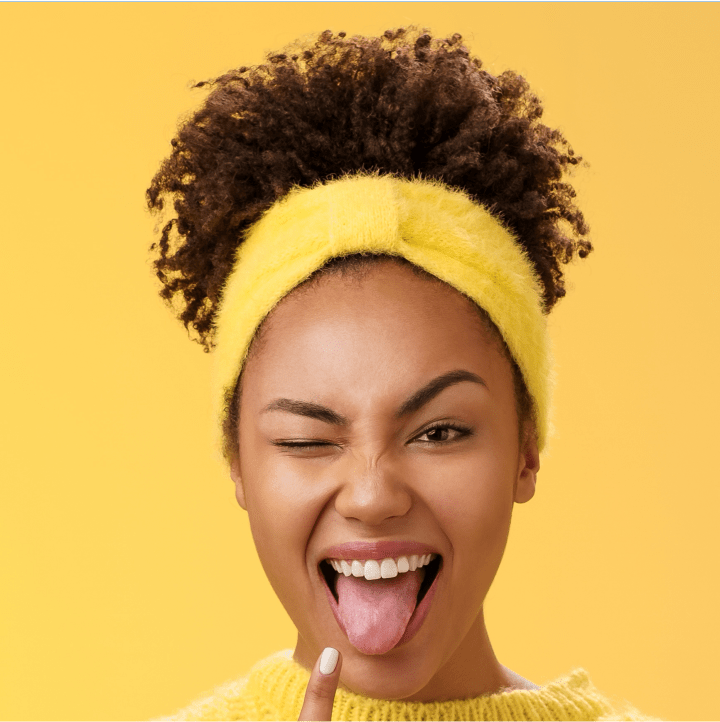 Happy African woman with yellow hair band embracing human connection anytime, anywhere on Video Match